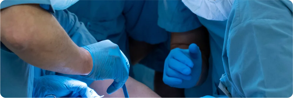 doctor operating on patient