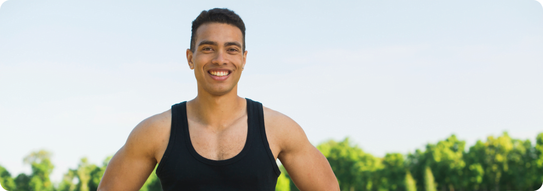 man standing and smiling